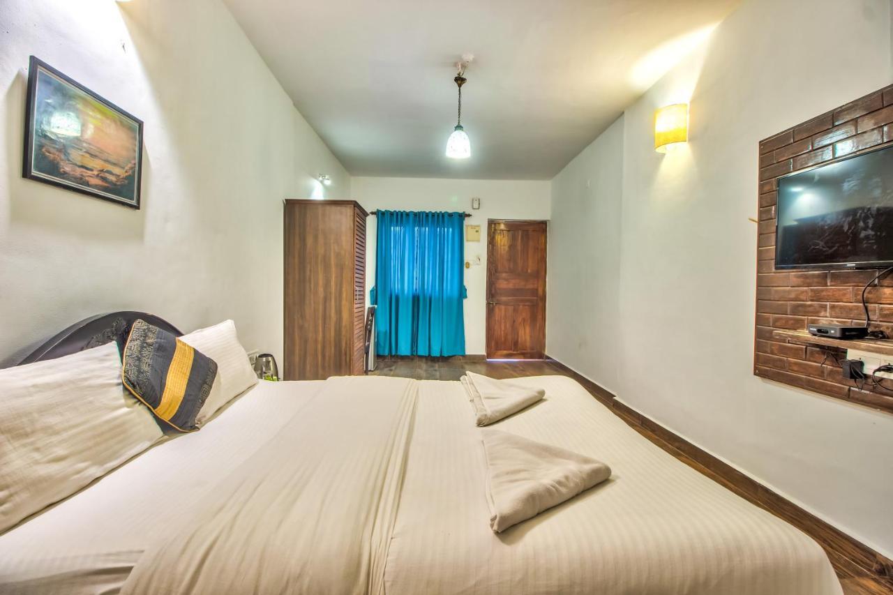 Stanleys Guest House Baga Exterior photo